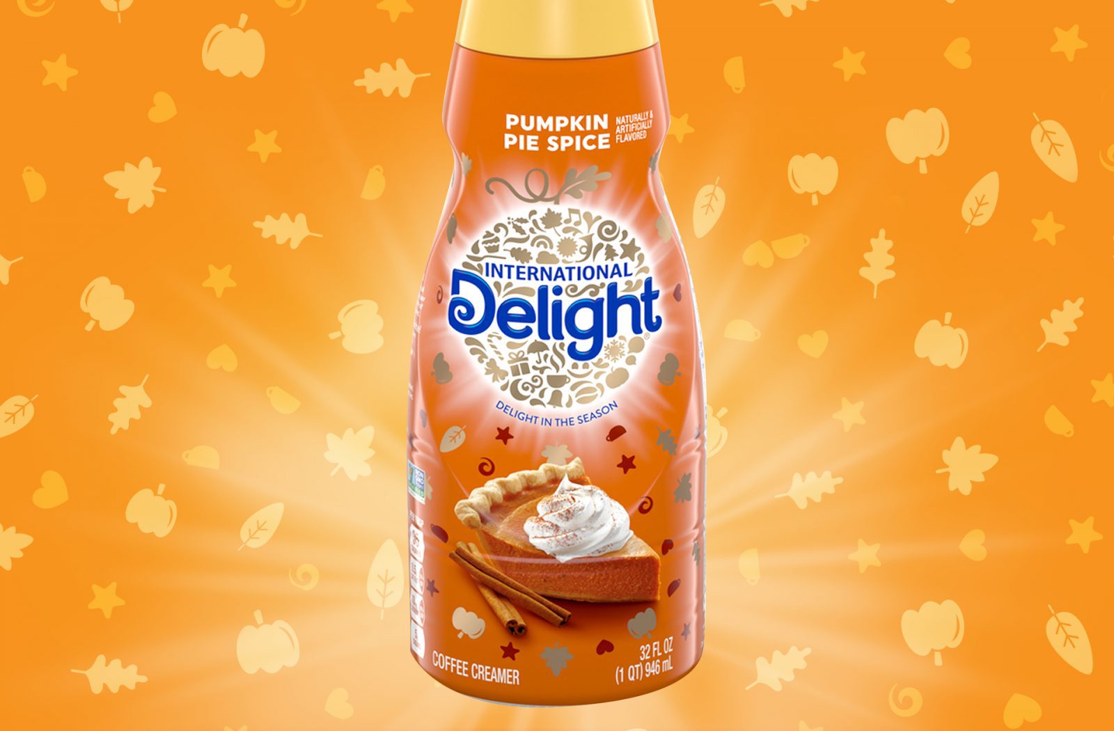 Product photography of a pumpkin spice seasonal fall variant for international delight coffee creamer, showcasing brand identity design services for consumer packaged goods.