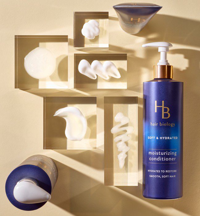 Product photography of three Hair Biology hair care products, showcasing Cpg packaging design services.