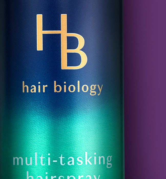 Close up photograph of a Hair Biology hair care product, showcasing cpg branding and logo design services.
