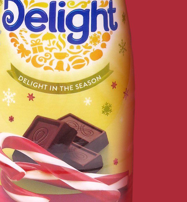 Close up photograph of a seasonal variant for international delight coffee creamer, showcasing packaging design services for consumer packaged goods.