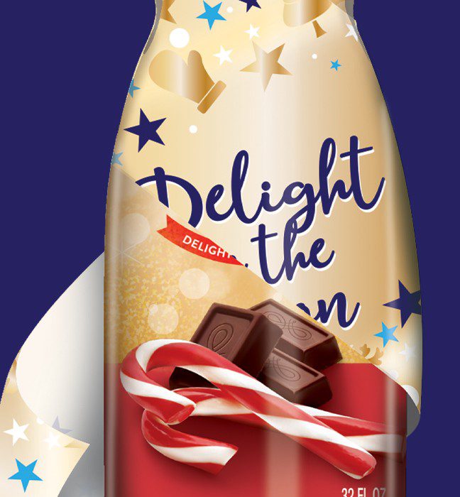 Close up photograph of two seasonal holidays variant for international delight coffee creamer, showcasing Cpg packaging design services.