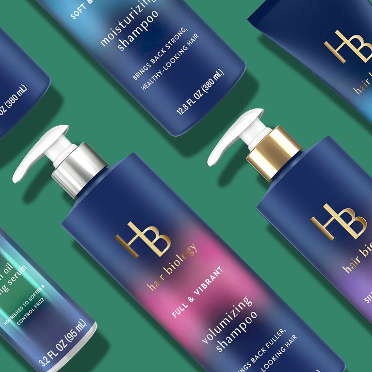 Render of a full product line of Hair Biology hair care products, showcasing packaging design services for consumer packaged goods.