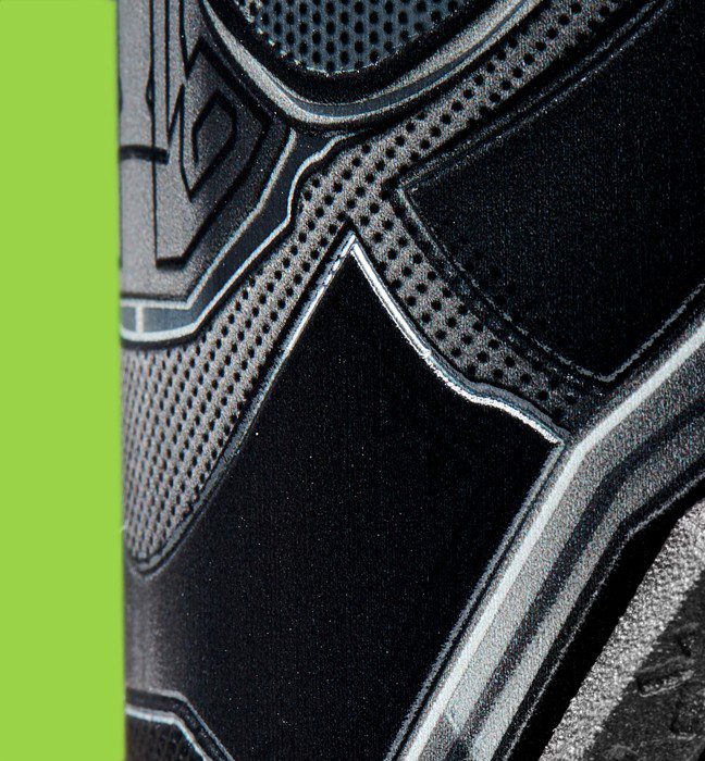 Close up photograph of the high build tactile varnish to emphasising graphic elements used for an influencer experience created for a limited edition brisk collaboration with Marvel Studio’s Black Panther.