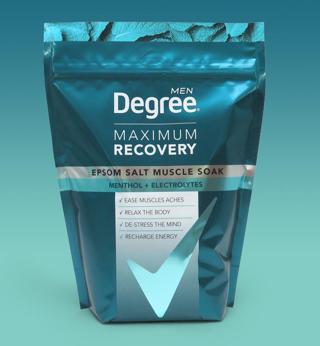 Photograph of a comps developed for a product line extension for Degree Maximum Recovery Epsom Salt Muscle Soak, featuring metallic effects and a reimagined use of the brandmark.