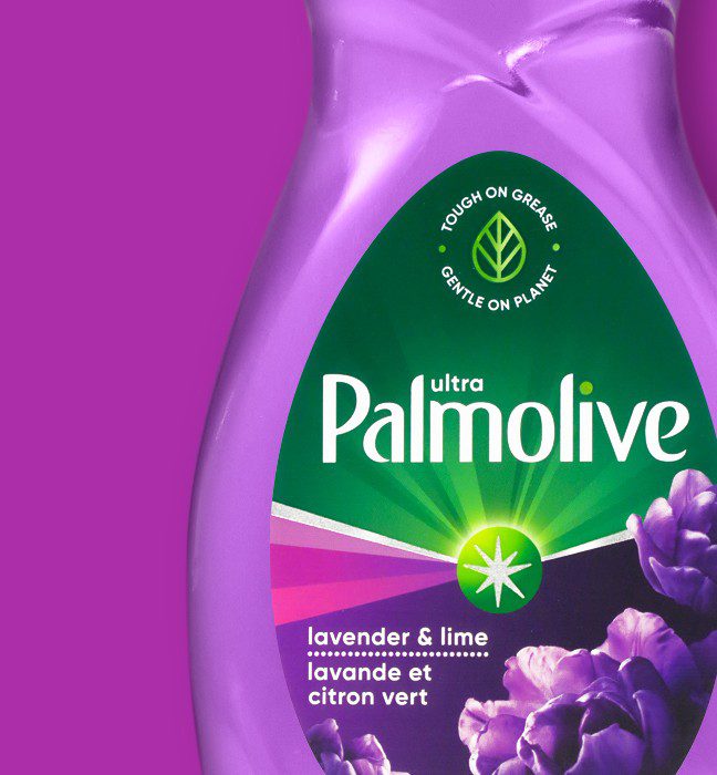 Close up photograph of a bottle of lavender & lime palmolive dish soap, featuring a vector design system used to create sales samples by a cpg packaging printing agency.
