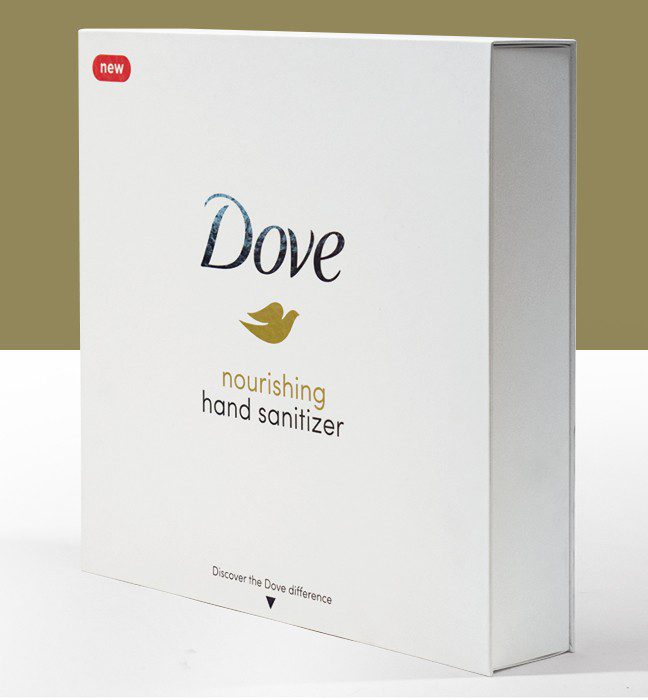 Close-up shot of the outside of an unboxing experience sales kit promoting skin moisturizing Dove hand sanitizer.