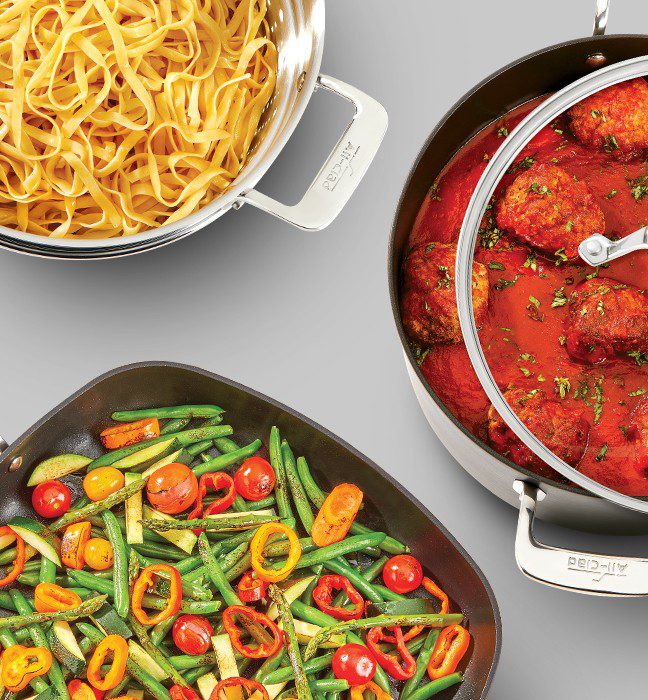 Product photography of All-clad metalcrafters essential nonstick cookware in use with different foods.