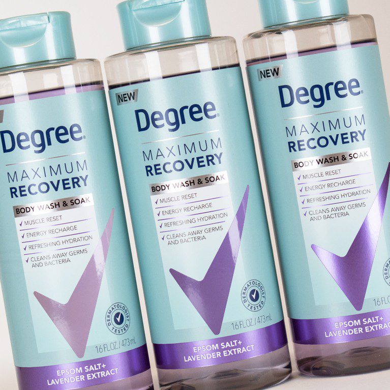 Photograph of three comps developed for a full product line extension for Degree Maximum Recovery Body Wash, featuring Clear metallic effects and a reimagined use of the brandmark.