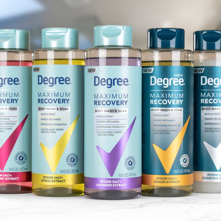 Photograph of five comps developed for a full product line extension for Degree Body Wash, featuring Clear variant segmentation and a reimagined use of the brandmark.