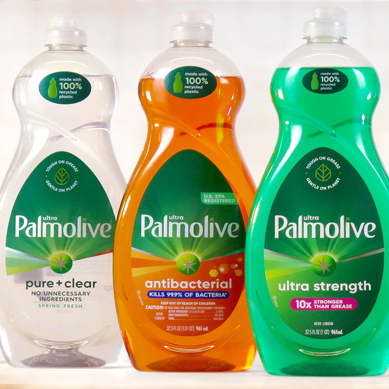 Photograph of three distinct variants of palmolive dish soap bottles, featuring print targets developed for sales samples created by a product packaging production agency.