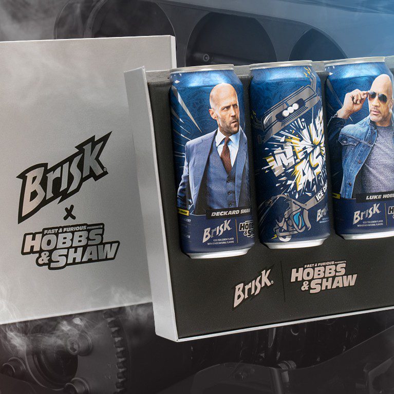 Render of three cans of Brisk with custom limited-edition packaging inside an influencer unboxing experience for the Hobbs and Shaw premiere collaboration with Brisk.