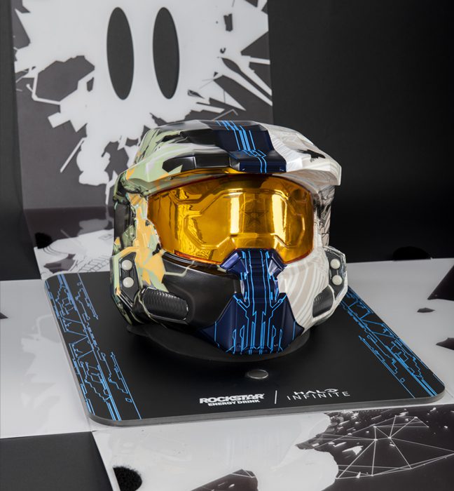 Photograph of a limited edition illustrated Master Chief helmet created as an influencer unboxing experience promoting Rockstar Energy and Halo Infinite.