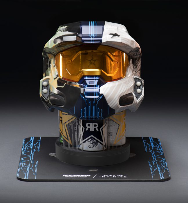 Photograph of a limited edition illustrated Master Chief helmet with five cans of rockstar energy inside, created as an influencer unboxing experience promoting Rockstar Energy and Halo Infinite.