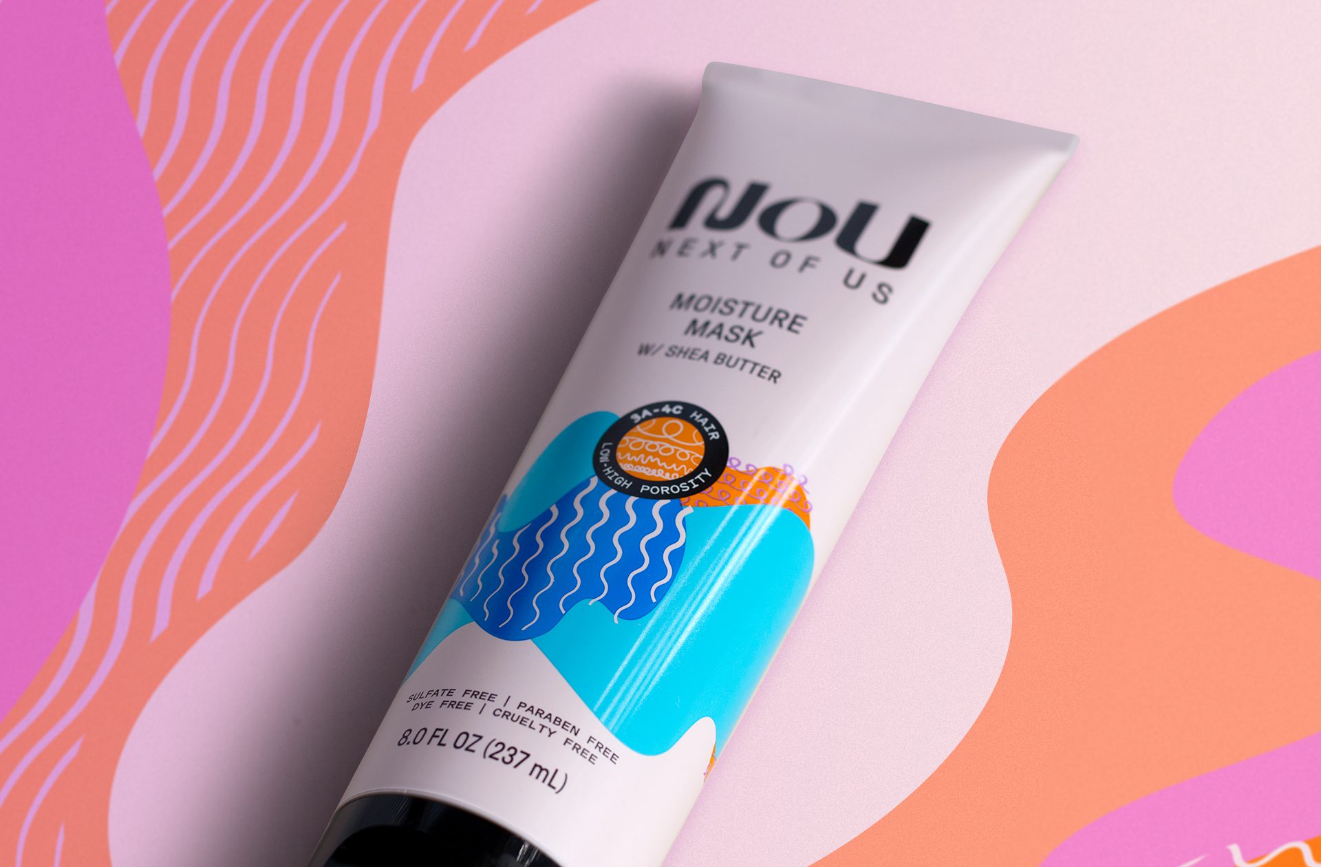 Product photography of a nou hair care moisture mask, showcasing packaging design services for consumer packaged goods.