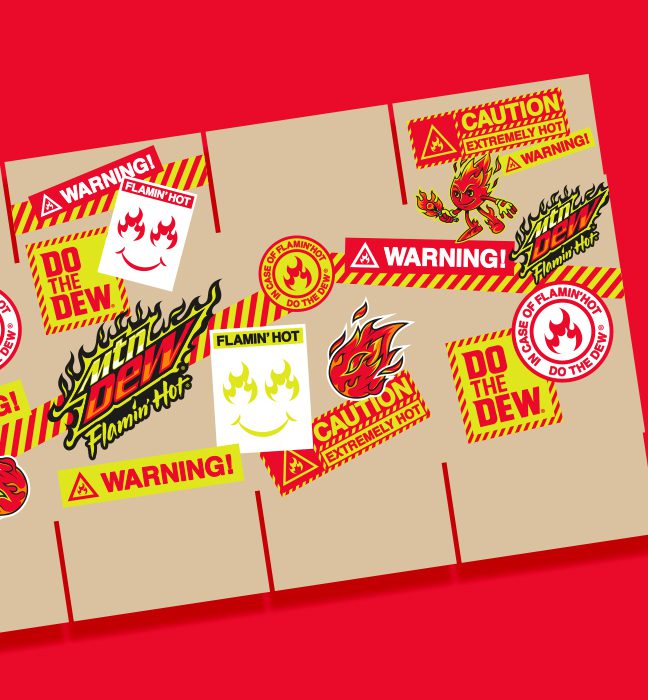 Render of a unique corrugate shipper outfitted with the brands iconic logos, phrases and mascot created for the influencer unboxing experience kits promoting the limited edition flavor FLAMIN HOT Mountain Dew.