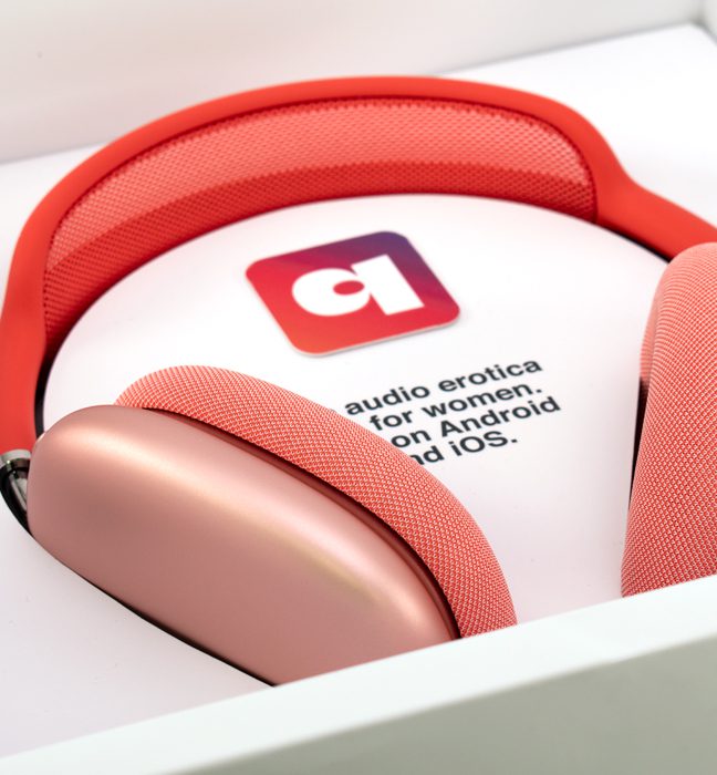 Photograph of the pink Quinn headphones inside an Influencer Unboxing Experience for the Quinn app.