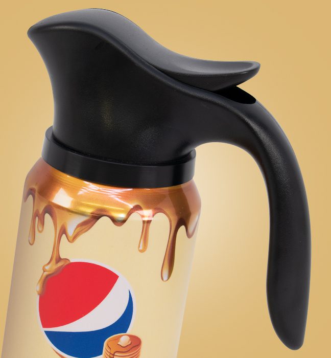 Photograph of a can of cola with a custom Pepsi Spout, inspired by the iconic IHOP syrup pitchers, from an influencer unboxing experience promoting the limited edition IHOP x Pepsi maple syrup flavor.