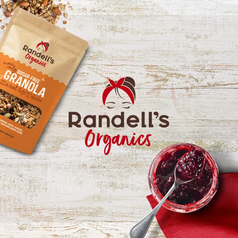 Render of promotional imagery for startup business Randell’s Organics, featuring packaging, a jar of jam and the brand's logo, showcasing cpg branding and logo design services.