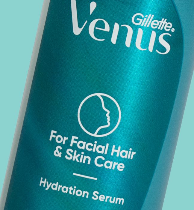 Close up photograph of the packaging metallic shimmer effects on a dermaplaning at home skincare range by Gillette Venus, showcasing brand identity design services for consumer packaged goods.